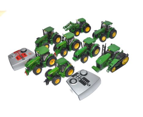 A group of unboxed farm models from Britains, Siku, Ertl etc. Tractor issues as shown, John Deere theme. Note two Siku Contro