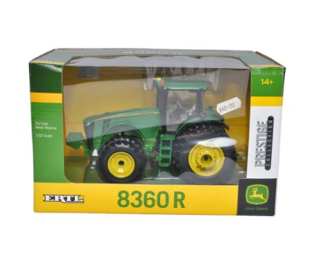 Ertl 1/32 diecast farm model issue comprising John Deere 8360R Tractor, Prestige edition. Looks to be excellent, secure in bo