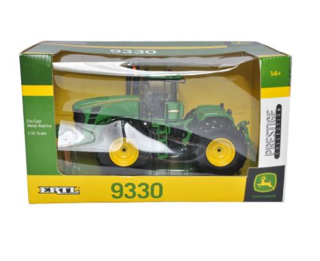Ertl 1/32 diecast farm model issue comprising John Deere 9330 Tractor, Prestige edition. Looks to be excellent, secure in box