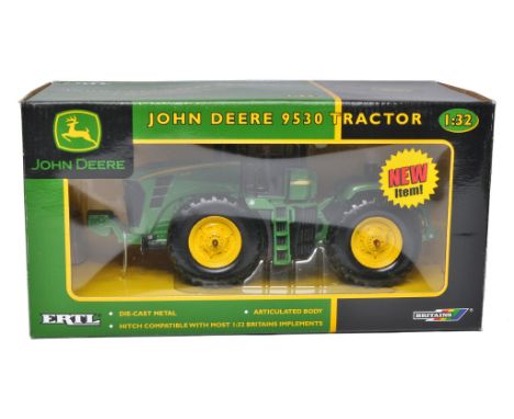 Britains 1/32 diecast farm model issue comprising John Deere 9530 Tractor. Looks to be excellent, secure in box. Box is very 