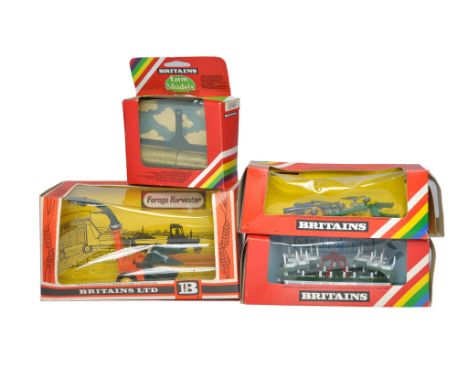 Britains 1/32 Farm Model issues comprising Four boxed implements as shown. Generally good in fair to good boxes. 