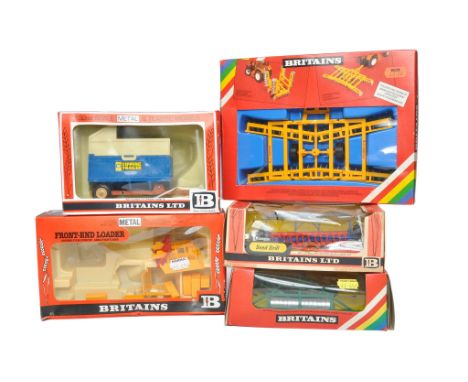 Britains 1/32 Farm Model issues comprising Five boxed implements as shown. Generally good in fair to good boxes. 