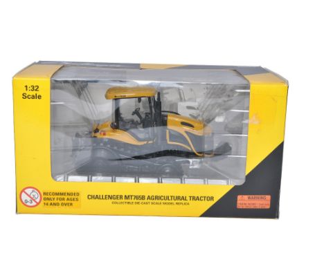Norscot 1/32 diecast farm model issue comprising Challenger MT765B Tractor. Looks to be excellent, secure in box. Box is good