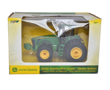 Britains / Ertl 1/32 diecast farm model issue comprising John Deere 8330 Dual Wheel Tractor, dealer edition. Looks to be exce
