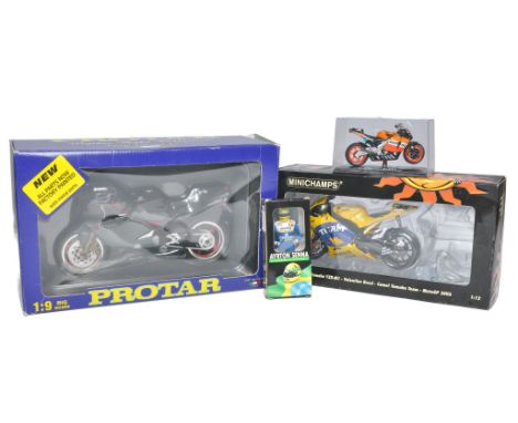 Protar 1/9 diecast model motorcycle in addition to Minichamps issue and one other as shown. Plus Senna figurine. In boxes. 