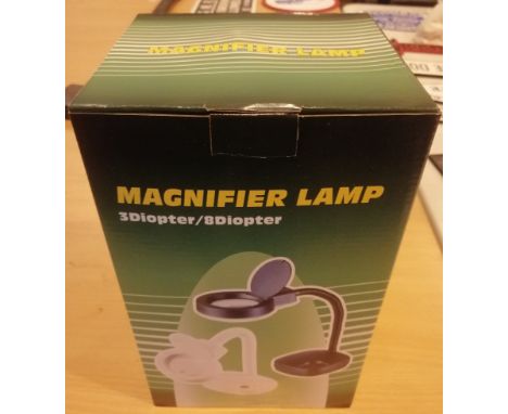 New and boxed 3/8 magnifier lamp. P&amp;P Group 2 (£18+VAT for the first lot and £3+VAT for subsequent lots) 