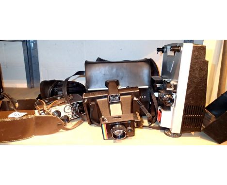 Vintage Sportstar Bell and Howell video camera, a Hanimex loadmatic 720 projector and further cameras. Not available for in-h