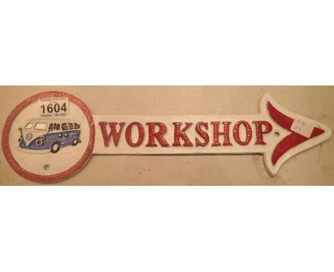 Cast iron VW workshop arrow sign, L: 41 cm. P&amp;P Group 2 (£18+VAT for the first lot and £3+VAT for subsequent lots) 