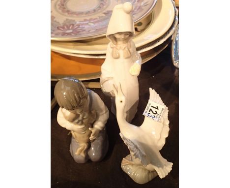 Two Lladro figurines and a Nao kneeling boy. Not available for in-house P&amp;P, contact Paul O'Hea at Mailboxes on 01925 659