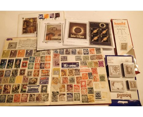 Mixed world stamp album with four silk first day covers and mixed stamp mounts. P&amp;P Group 1 (£14+VAT for the first lot an