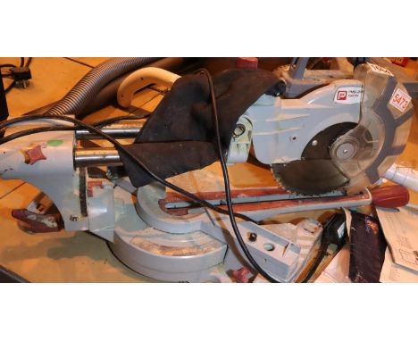 PMS210L sliding mitre saw. Not available for in-house P&P, contact Paul O'Hea at Mailboxes on 01925 659133Condition Report: A