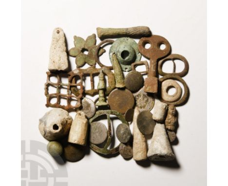 15th-20th century A.D. Comprising weights; buckles; buttons; keys; a thimble and finger ring; together with other items.   50