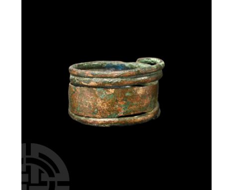 Circa 8th century A.D. With broad hoop tapering to round-section extensions forming a coiled continuation of the hoop; Baltic