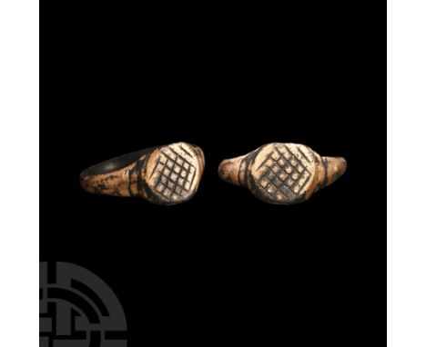 Circa 15th-16th century A.D. With bands to the shoulders and hatching on the bezel. Cf. Chadour, A.B., Rings. The Alice and L