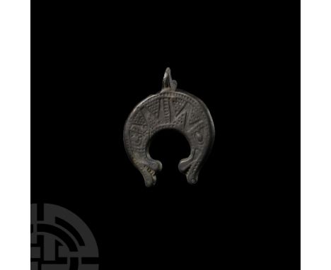 Circa 12th century A.D. Of Scandinavian type (also widespread in the historical Rus region), with beast-head finials, panels 