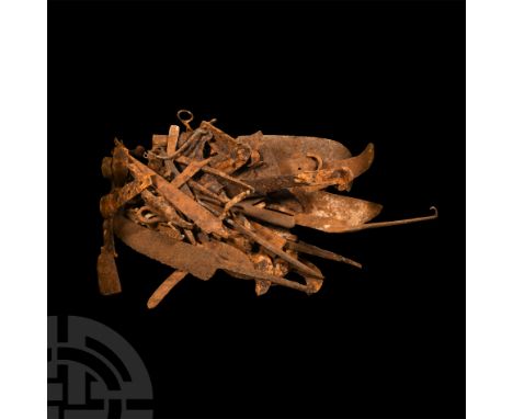 Circa 15th-16th century A.D. Mainly comprising cleavers, axeheads, scythes and other tools and miscellaneous items.   9.4 kg 