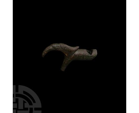 16th-17th century A.D. With stylised detailing to the crescentic extension, flat-section handle below. Cf. Leahy, K. and Lewi