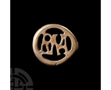 2nd-3rd century A.D. The monogram in Latin letters, ('R'+'M'+'A', with the 'O' represented by the circular plan of the brooch