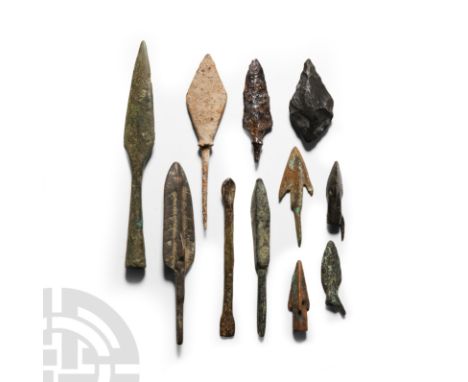 Circa 17th millennium B.C.-6th century A.D. Comprising a Mesolithic flint arrowhead of triangular form; a paddle shaped arrow