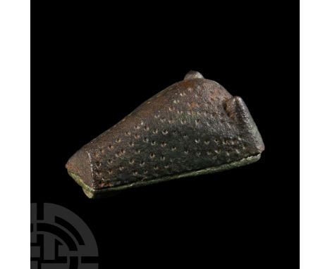 10th-11th century A.D. Trapezoidal in plan with zones of pointillé detailing, separate base-plate with catch and pin. Cf. Mac