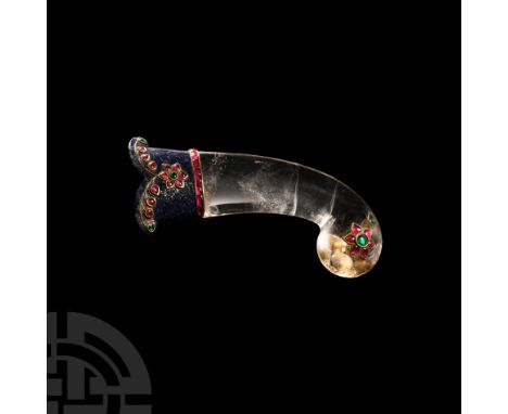 Late 20th century A.D. The polished rock crystal upper body with pink ruby and green glass floral inlays, band of ruby inlays