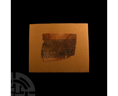 Circa 6th-7th century A.D. Comprising a large fragment of a vertical band (clavus) from a tunic, woven in yellow linen and pu
