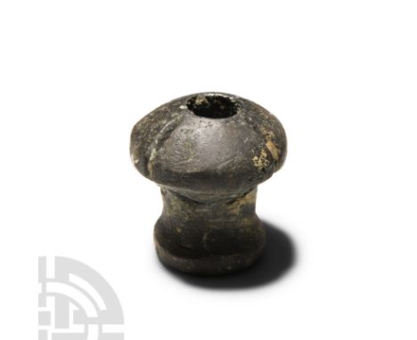 9th-8th century B.C. With cylindrical head and narrow flanged base, the head divided in four petals. See Gorelik, M., Weapons