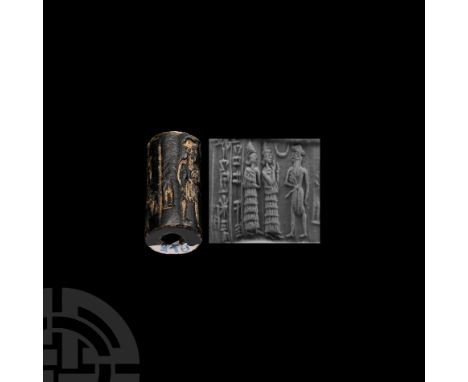 2nd-1st millennium B.C. With frieze depicting a standing figure in knee-length robe approached by two bearded figures in tier