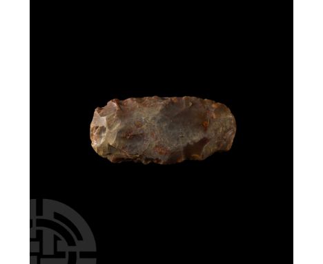 Neolithic Period, 8th-5th millennium B.C. Of thin lentoid section with convex cutting edge; showing milky patination to one s