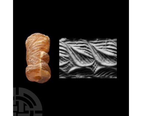 Circa 3rd millennium B.C. With incised design of interlaced parallel bands.  Cf. Teissier, B., Ancient Near Eastern Cylinder 