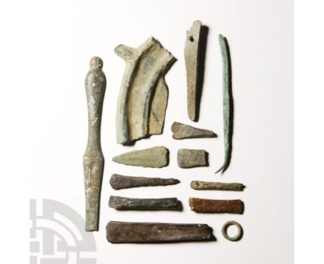 Circa 2nd-1st millennium B.C. Principally: a variety of chisels and other implements and a votive axehead, together with othe