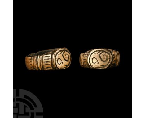 14th-15th century A.D. With bands and hatching to the shoulders, ellipsoid bezel with scroll motifs. Cf. Chadour, A.B., Rings