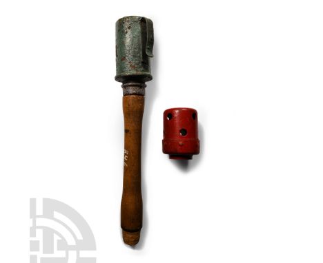 1914-1945 A.D. German practice stick grenade group including: a WWII model 24 Stielhandgranate with pierced red-coloured head