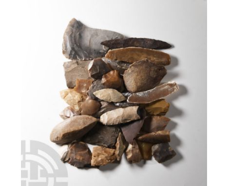 Neolithic Period, 8th-5th millennium B.C. Comprising a group of mixed stone implements, mostly in flint or chert and knapped,