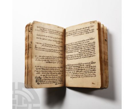 18th-19th century A.D. With saddle-stitched binding, manuscript blocks of Arabic-script black-ink text, small heading text; s