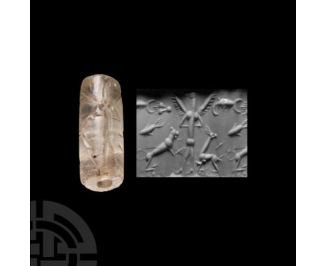 2nd-1st millennium B.C. Carved with a winged figure flanked by birds and animals. Cf. Collon, D., Near Eastern Seals, London,