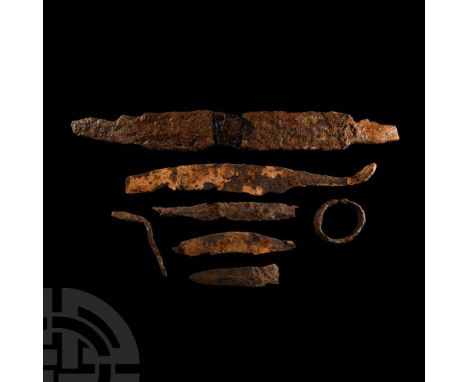 Circa 6th-7th century A.D. Comprising a straight cutting edge battle knife with a short tang; a shorter slender cutting edge 