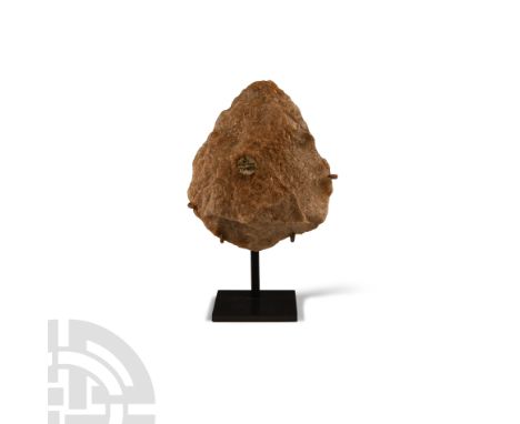 Lower Palaeolithic Period, circa 1.5-1.0 million years B.P.. Knapped bifacial hand axe of neat form with slightly rounded but