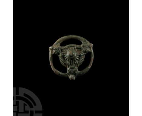 9th-11th century A.D. Central dome with three radiating beast-heads gripping the outer ring in their jaws. Cf. MacGregor, A. 