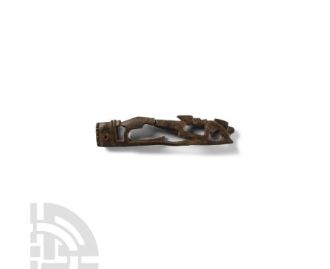 Circa 2nd century A.D. The openwork body displaying a stylised hunting scene and decoratively notched collar to one end.   12