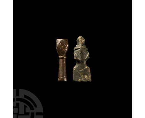9th-14th century A.D. The pin finial formed with a round-section stem and facetted head, each of four faces displaying a punc