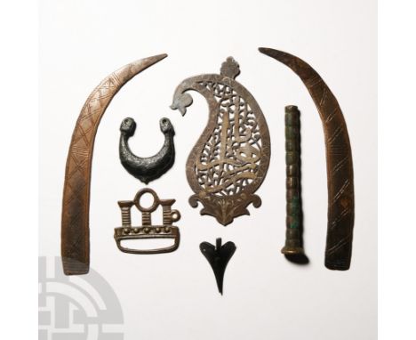 1st-2nd millennium A.D. Comprising various decorative fittings and other artefacts, including a pierced calligraphic mount.  