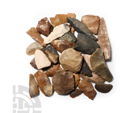 Neolithic Period, 8th-5th millennium B.C. Comprising a group of mixed stone implements, mostly in flint or chert and knapped,