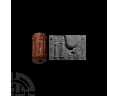 2nd-1st millennium B.C. With incised frieze of a seated figure in a tiered garment and a standing figure in floor-length garm