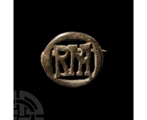 2nd-3rd century A.D. With openwork monogram in Latin letters, ('R'+'M'+'A', with the 'O' represented by the circular plan of 