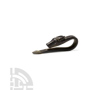Late 1st millennium B.C. Modelled in the round with naturalistic detailing, probably a ladle finial.   17 grams, 51 mm (2 in.