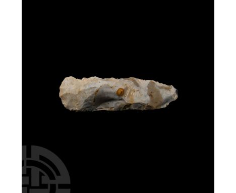 Mesolithic Period, 15th-10th millennium B.C. Being a slender knapped flint axe of generally triangular cross-section with con