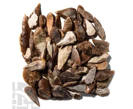 Neolithic Period, 8th-5th millennium B.C. Comprising mostly bifacial and uniface leaf-shaped flint and chert arrowheads, a fe