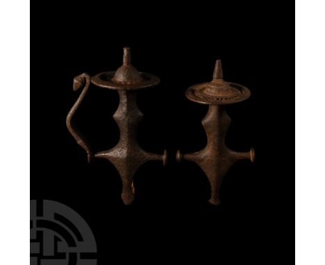 19th century A.D. Both with lozenge-section quillon block, shaped langet and scalloped grip, quillon with discoid terminals; 
