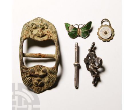 19th-20th century A.D. Comprising: a sterling silver butterfly brooch; a stamped silver mount; brooch designed with an openwo